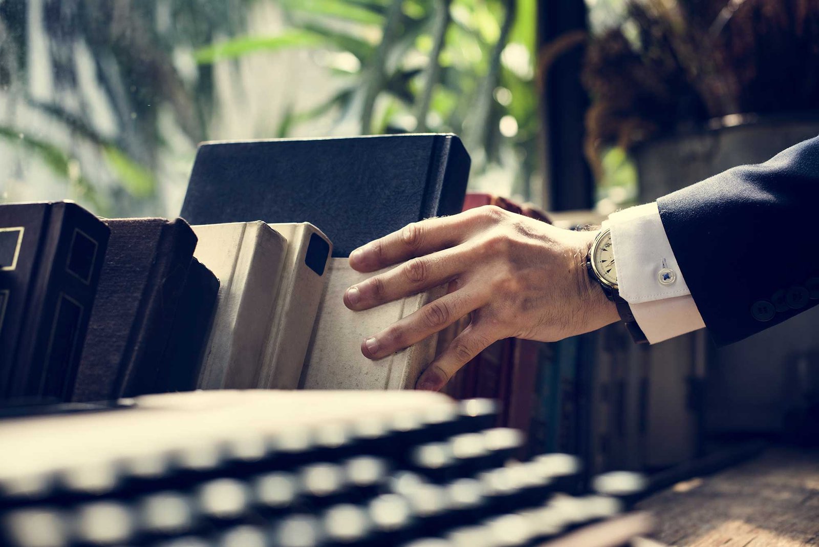 closeup of hand getting a book 2022 12 15 23 41 52 utc 1